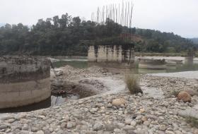 स्थानीयवासीको जिज्ञासा , लम्सुवाघाट पक्की पुल १५ वर्षसम्म किन बनेन ?